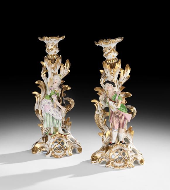 Pair of Jacob Petit Figural Candlesticks: Pair of Jacob Petit Pierced Porcelain Figural Candlesticks, mid-19th century, Paris, in the Rococo Revival taste, decorated with figures in 18th-century costume, each signed "J.P." in underglaze blue,