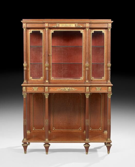 Good Louis XVI-Style Acajou Manchette Vitrine: Good Louis XVI-Style Acajou Manchette Vitrine, late 19th century, the central drawer lock signed "Millet a Paris", the breakfront-molded cornice above a conforming paneled frieze centered by an ormolu