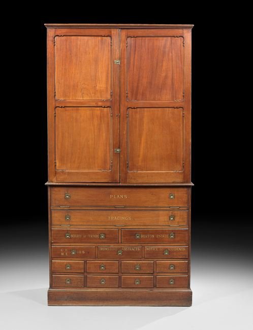 Edwardian Mahogany Engineer's Cabinet: Edwardian Mahogany Engineer's Cabinet, early 20th century, the molded cornice above a case fitted with two doors, each inset with two shaped panels and opening to a shelved interior, the lower section