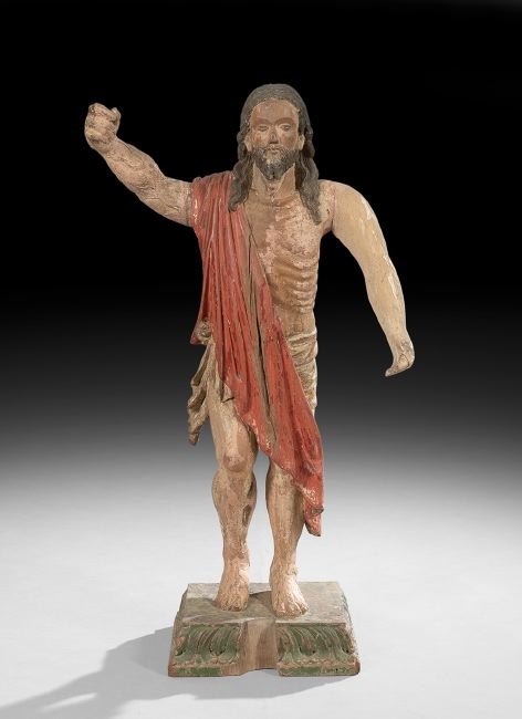 Latin American Altar Figure of John the Baptist: Latin American Carved Wood and Polychrome-Painted Altar Figure of John the Baptist, 19th century, the figure draped in a vermilion robe, over drapery retaining traces of gilt, on a leaf-carved and gre