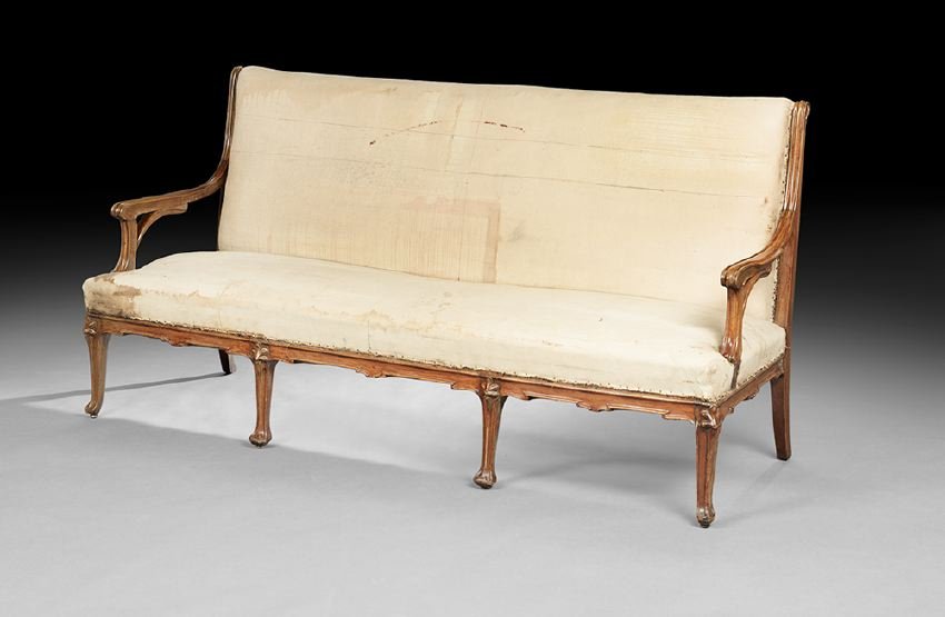 Art Nouveau Mahogany Settee: Art Nouveau Mahogany Settee, early 20th century, probably by Majorelle, the padded rectangular back joined by shaped and paneled arms to the padded seat, raised above a paneled frieze on molded legs h