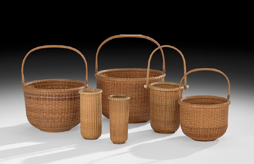 Six Graduated Nantucket Lightship Baskets: Group of Six Graduated Nantucket Lightship Baskets, fourth quarter 20th century, the three largest examples branded by the maker, Jeanne Reis, one with an ivory button on the base and dated 1981, the 