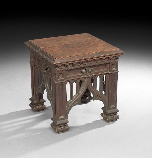 English Oak End Table: English Oak End Table, 19th century, in the Gothic taste, the square top with a molded edge, above a pierced Gothic-arch frieze, raised on molded block feet, h. 19-1/2", w. 19", d. 19". Provenance: Pe