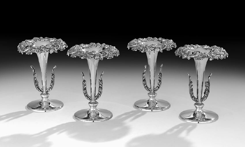 Four American Sterling Silver Trumpet Vases: Set of Four American Sterling Silver Trumpet Vases, ca. 1900, by the Mauser Mfg. Co., New York, New York, each with a narrow standard and broadly everted rim decorated with embossed and pierced flower