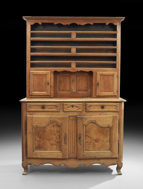 French Provincial Fruitwood Vasselier: French Provincial Fruitwood Vasselier, mid-19th century, the molded cornice above three open plate shelves and two paneled end cupboards flanking a paneled backpiece, the lower section with a canted r