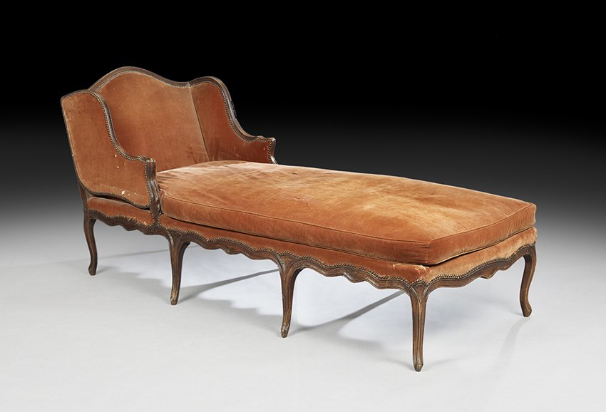 Provincial Louis XV-Style Fruitwood Chaise Longue: Provincial Louis XV-Style Fruitwood Chaise Longue, mid-19th century, the domed and padded back joined by shaped downswept and padded arms to the cushioned seat, raised on molded cabriole legs ending i