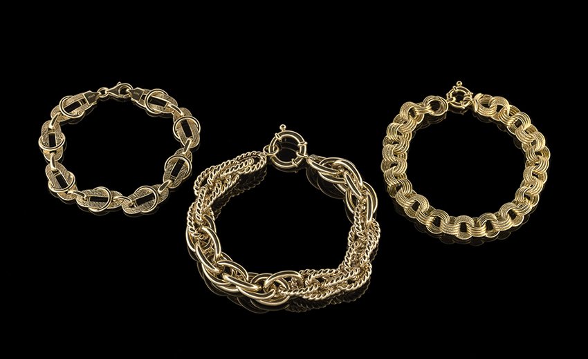 Three 14 Kt. Yellow Gold Bracelets: Three Fourteen-Karat Yellow Gold Bracelets, the three hollow link bracelets all made in Italy, l. 7-1/2", 8" and 8-1/2", 24.8 grams total weight.