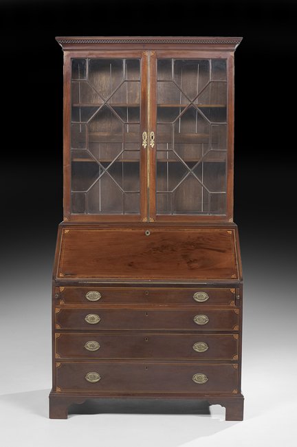 George III Mahogany Secretary Bookcase: George III Mahogany Secretary Bookcase, late 18th century, the molded and dentillated cornice above two astragal-glazed doors, the lower section fitted with a slant front, opening to an inset leather 
