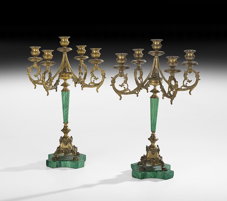 Pair of Malachite and Gilt-Bronze Candelabra: Pair of Malachite and Gilt-Bronze Five-Light Candelabra, ca. 1900, probably French, the scrollwork arms supported by tapered column-form standards, on paw-footed bases mounted on conforming plinths, h