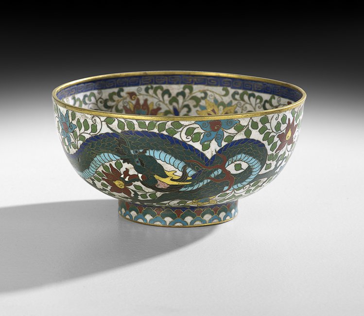 Chinese Cloisonne Enamel Bowl: Chinese Cloisonne Enamel Bowl, late Ming Dynasty (1368-1644)/early Qing Dynasty (1644-1911), the rounded bowl with a gilded lip and foot rim, the exterior decorated with a dragon pursuing a flaming pe