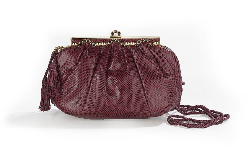 Judith Leiber Wine Karung Convertible Handbag: Vintage Judith Leiber Wine Karung Convertible Frame Handbag, late 1980s, the gathered karung body topped on both sides with alternating cabochon garnets and onyx beads and having a like clasp, the go