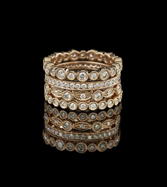 Four 18 Kt. Rose Gold and Diamond Stackable Rings: Four Eighteen-Karat Rose Gold and Diamond Stackable Rings, each eternity band mounted with round brilliant-cut diamonds, with an approximate total weight of 1.78 carats for all four rings, approximate