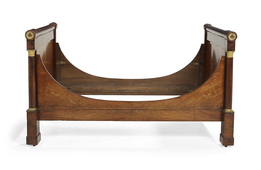 Empire Mahogany Lit du Jour: Empire Mahogany Lit du Jour, early 19th century, the headboard and footboard each with a columnar crest rail above a panel fronted by an ormolu-mounted columnar standard, joined by convex rails, raise