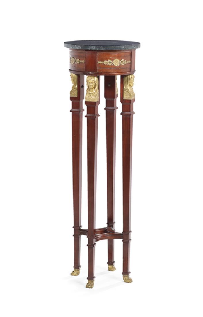 Empire-Style Mahogany and Marble-Top Torchere: Empire-Style Mahogany and Marble-Top Torchere, the circular marble top above a paneled ormolu-applied frieze, raised on four tapering square legs, each headed by an ormolu maiden and ending in brass p