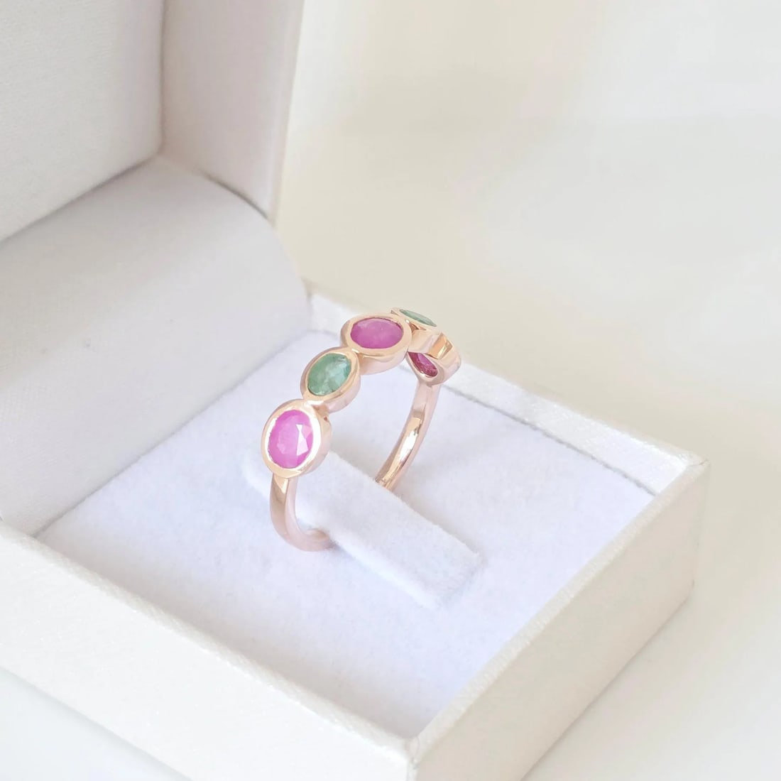 Elegant 1.71ct Ruby & Emerald Ring in 14K Rose Gold; GW Certified: A sophisticated 14K rose gold ring featuring 5 natural rubies and emeralds in European-style bezel settings. Handmade elegance with certified gemstones.Make a statement with this exquisite handmade ri