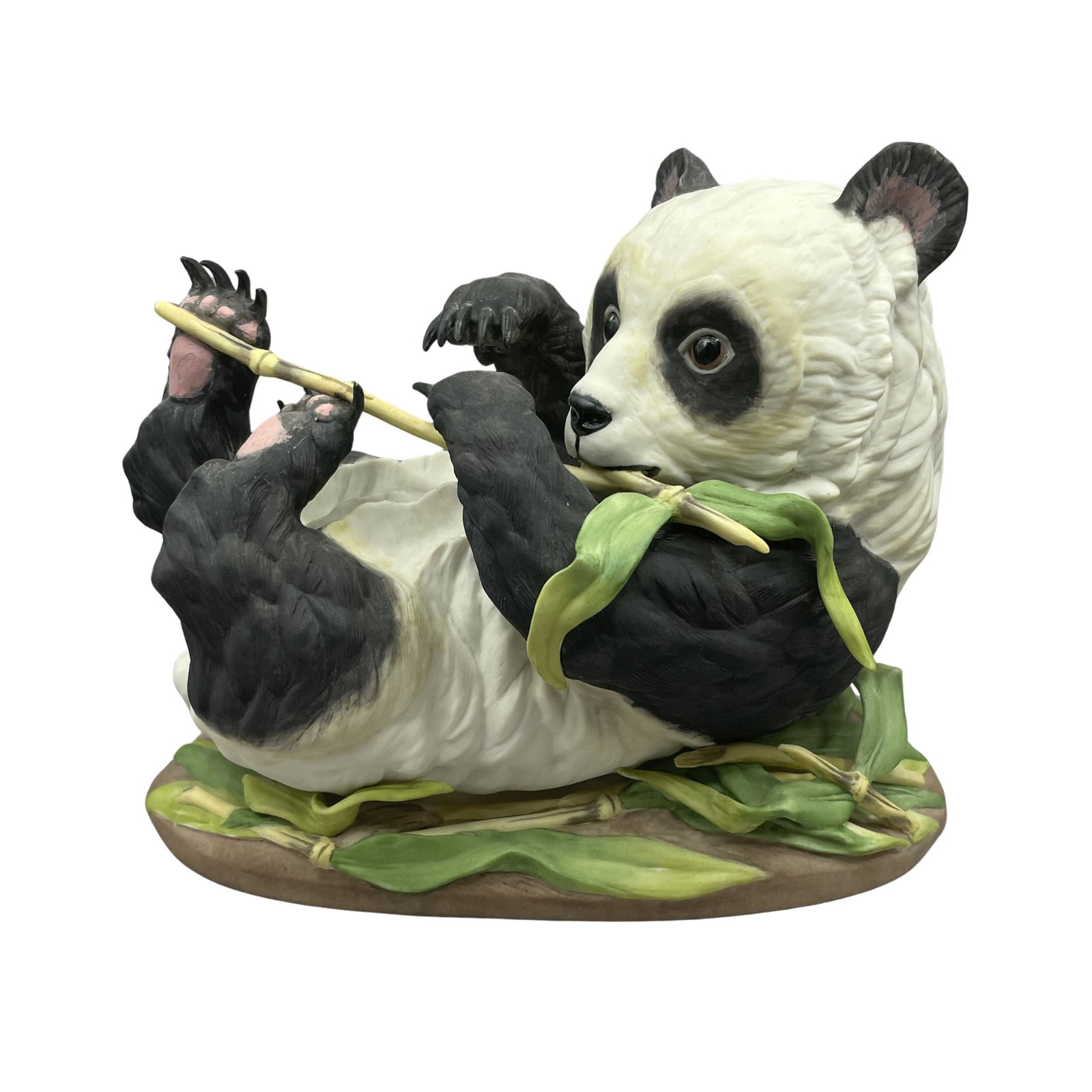 Edward Marshall Boehm "Panda Cub Lying" 400-47 American Porcelain: "Panda Cub Lying" by Edward Marshall Boehm 400-47 American Porcelain 1980s-1990s. This piece measures approximately 8" W x 6" H.