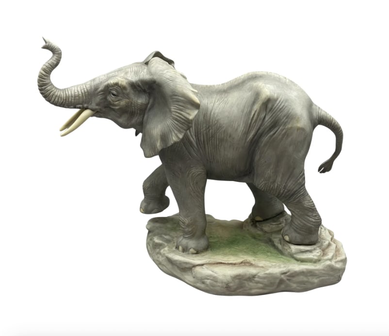 Edward Marshall Boehm, "African Elephant", 1996: "African Elephant" by Edward Marshall Boehm 1996 American Porcelain. This piece measures approximately 8.5" H x 9.5" W x 4.5" D.