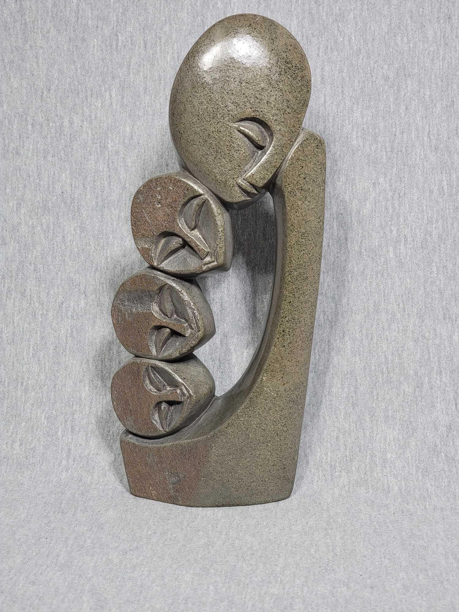 Shona Family of 4. SIGNED by Artist Innocent Chifutu.: Shona Family of 4. SIGNED by Artist Innocent Chifutu. Zimbabwe Sculpture from the Shona Villages. 11 x 5 x 2. A3