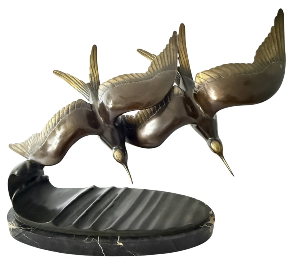 RENETI SIGNED BRONZE THREE BIRDS SCULPTURE: Impressive Reneti bronze sculpture depicting three stylized birds in flight, dynamically arranged with outstretched wings and elongated beaks. The composition captures the birds sweeping downward over