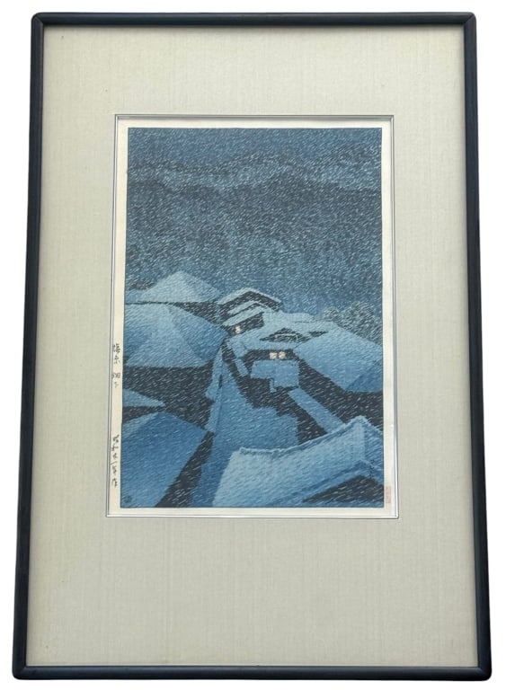 HASUI KAWASE "SHIOBARA HATOARI" WOODBLOCK PRINT: Hasui Kawase (Japan, 1883 - 1957) Japanese woodblock print on paper titled along the left margin Shiobara Hataori (Hataori in Shiobara). The composition features snow-covered rooftops beneath a dark e