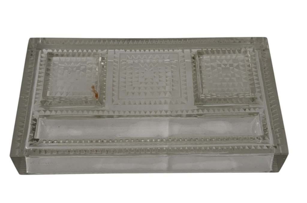 RENE LALIQUE FRENCH CRYSTAL GLASS DUAL INKWELL: Rene Lalique French Crystal Glass Dual Inkwell. A rectangular cut glass desk tray designed as an inkstand base, featuring a long recessed compartment for pens and two square recesses for inkwell bottl