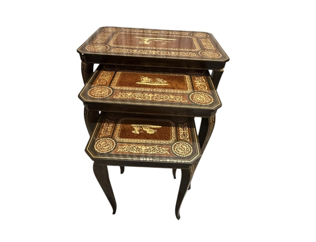 SET OF THREE CONTINENTAL MARQUETRY INLAID NESTINGS: The three graduated tables feature richly figured wood tops with extensive contrasting inlay, including classical figural/pastoral scenes, scrolling foliate borders, circular medallions and geometric 