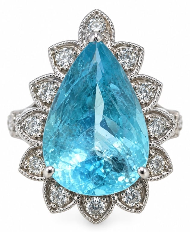 PLATINUM 5.96CT AQUAMARINE & .66CT DIAMOND RING 7G: Elegant platinum ring centered with a pear-shaped natural aquamarine weighing approximately 5.96 carats, framed by a floral-inspired halo of round brilliant-cut diamonds with additional diamonds set a
