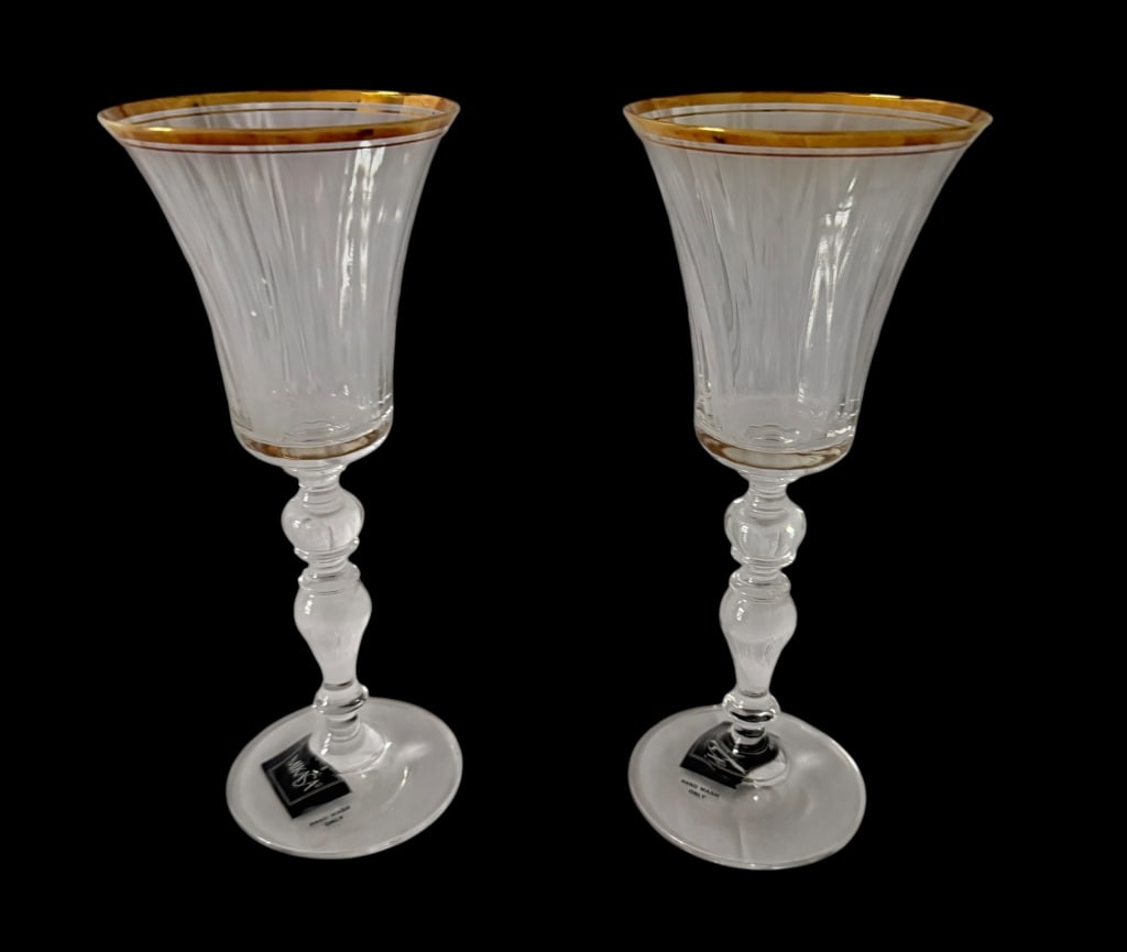 PAIR MIKASA VENETIAN GOLD CRYSTAL WINE GLASSES: Pair of Mikasa “Venetian Gold” lead crystal wine glasses, made in Austria. Each features a flared, vertically cut/ribbed bowl accented by a broad gold band and fine gold line at the rim, raise