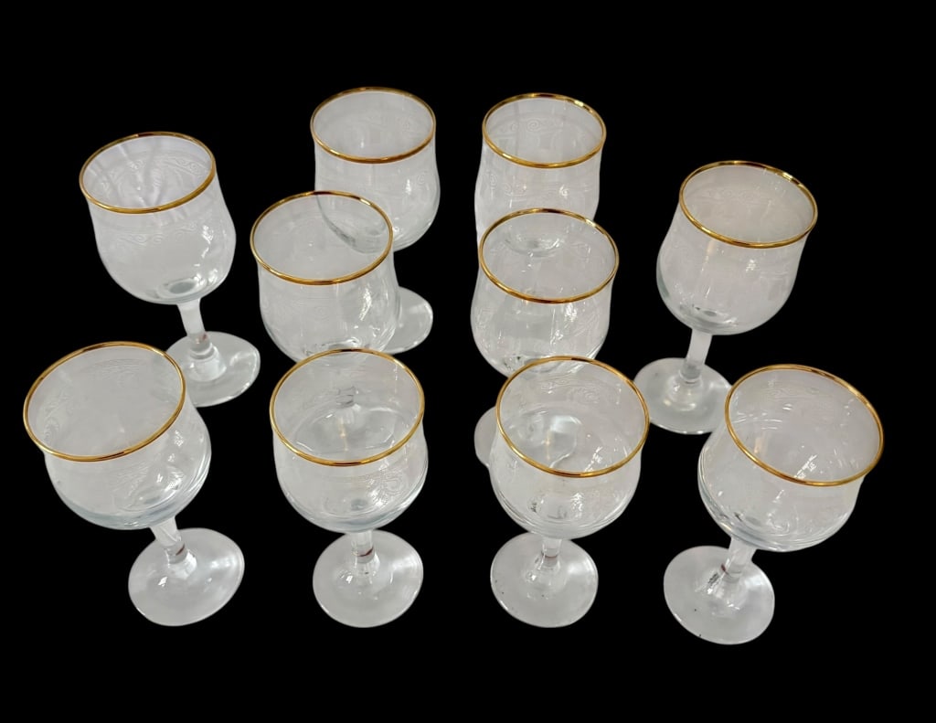 SET OF 10 ETCHED GLASS GOLD-RIMMED STEMMED GOBLETS: Set of ten vintage clear glass stemmed goblets, each featuring an elegant etched decorative band with scrolling foliate and geometric motifs. Finished with a gold-tone rim, rounded bowl, slender stem,