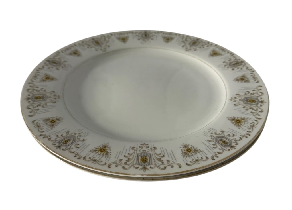 EVERBRITE BERKSHIRE JAPAN GILT CHINA DINNER PLATES: A pair of vintage Everbrite Berkshire Fine China dinner plates, made in Japan. Each features a white porcelain ground surrounded by an ornate repeating border of stylized floral medallions, geometric 