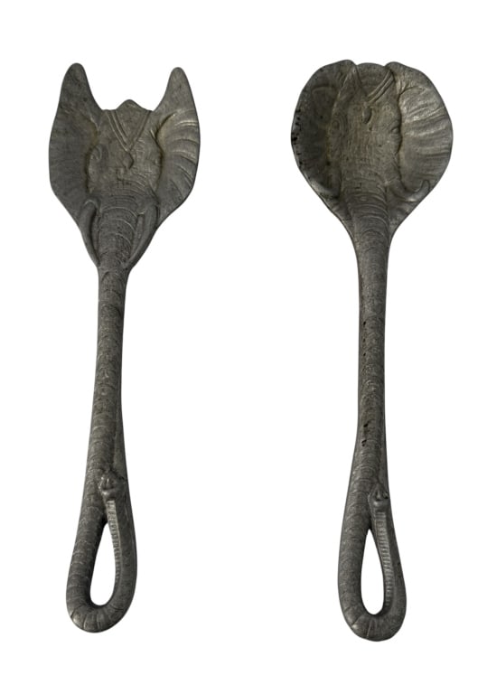 PAIR ARTHUR COURT CAST ALUMINUM SERVING UTENSILS: This is a pair of salad serving utensils, including one spoon and one two-tined fork, designed by Arthur Court. The set is made of sand-cast aluminum featuring a stylized cobra motif. The handles are 