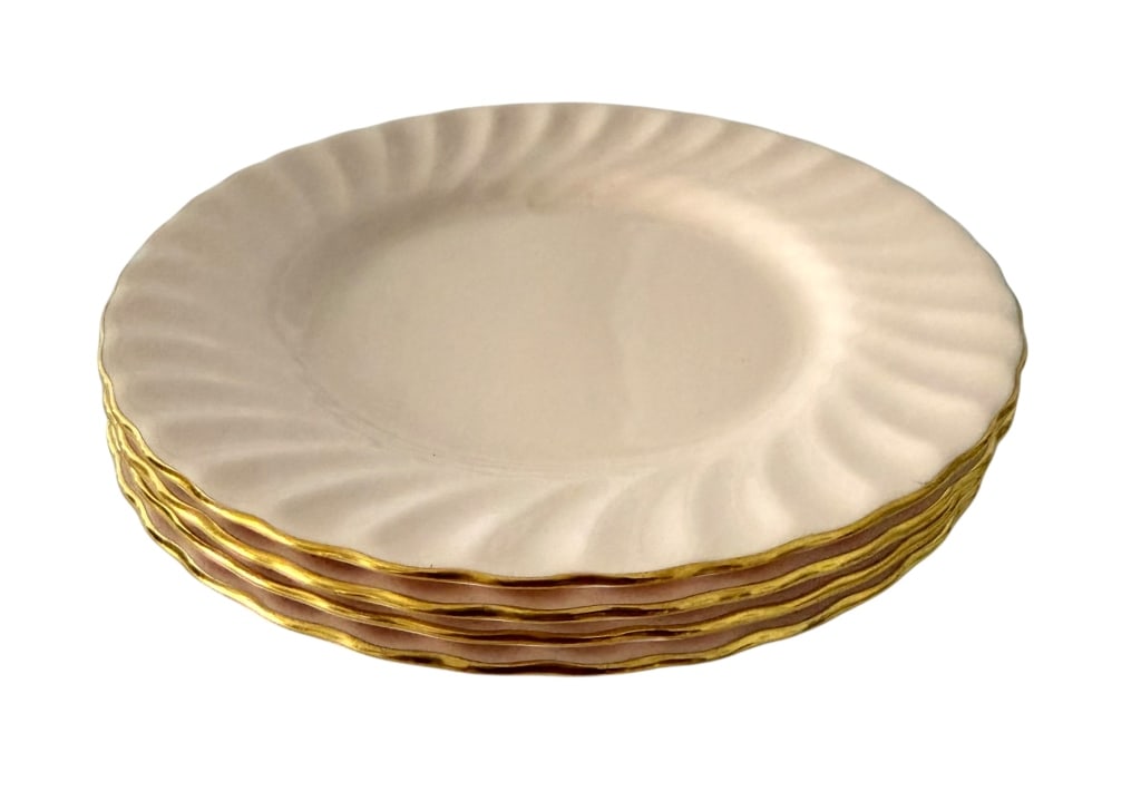 4 MINTON ENGLISH BLUSH PINK GOLD TRIM PLATES: Elegant set of four Minton bone china plates, made in England. Each plate features a soft blush-pink/cream ground with a gently scalloped edge and molded spiral-fluted decoration radiating around the 