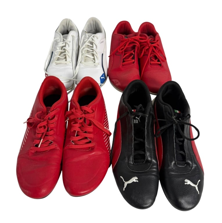 4 PAIRS OF PUMA MENS FERRARI/BMW SHOES SIZE 12: Collection of four pairs of men's Puma motorsport shoes, all Size 12, featuring Ferrari and BMW racing-inspired designs. Includes two red Ferrari pairs, one black and red Ferrari pair, and one white B