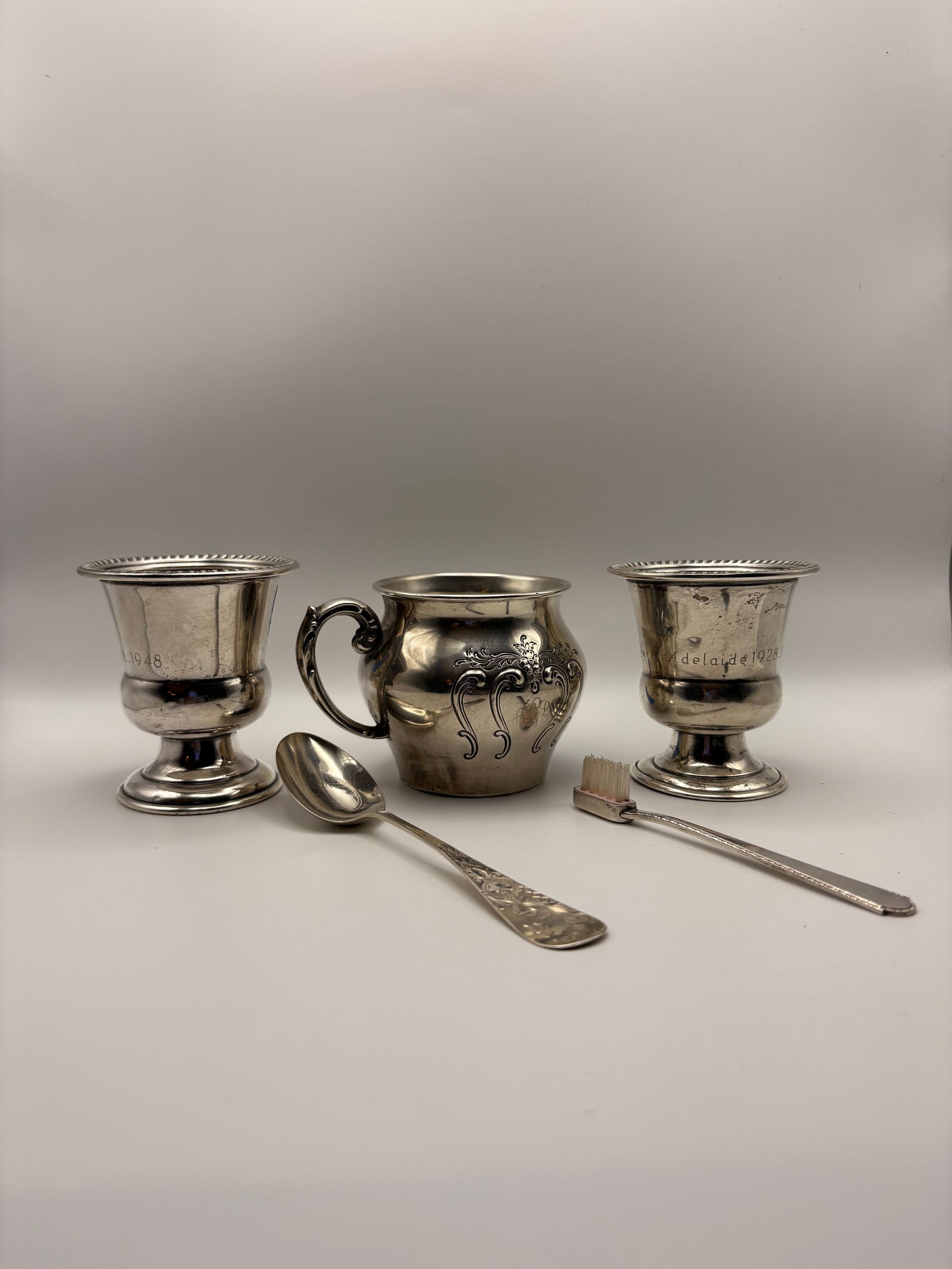 5 Miscellaneous Sterling Silver items including A Baby Cup by "Gorham": 1) Adorable Sterling Silver Baby Cup Marked Gorham Sterling Silver # 1217,Has a raised design on both sides weighs 2.32 toz and measures 4'x 3"x 2 5/8", no Monograms and in perfect condition, 2) A Wei
