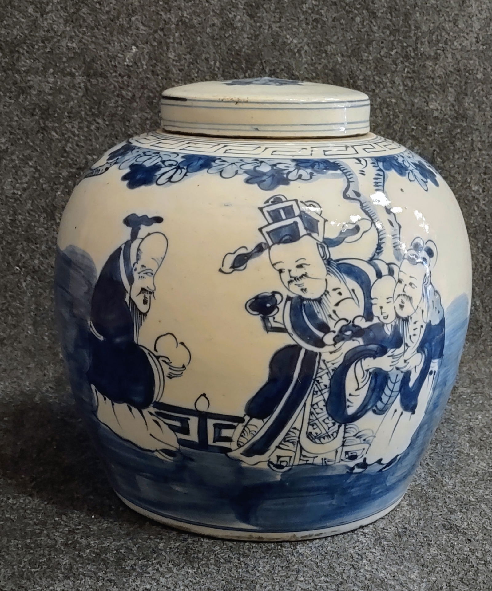 Antique Blue and White Porcelain Ginger Jar with Human Figural: A beautiful blue and white finished porcelain ginger jar with the hand painted human figures. A small chip on the lid.Measures 9"W x 9"H