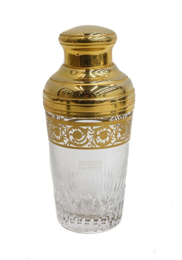 Martini Shaker in Thistle Gold by "Saint Louis": Saint Louis Cut crystal cut glass cocktail martini shaker in Thistle Gold. Inlay foliate scrolls to circular band. Acid etched Saint Louis mark to underside with original label to body.Measurements: A