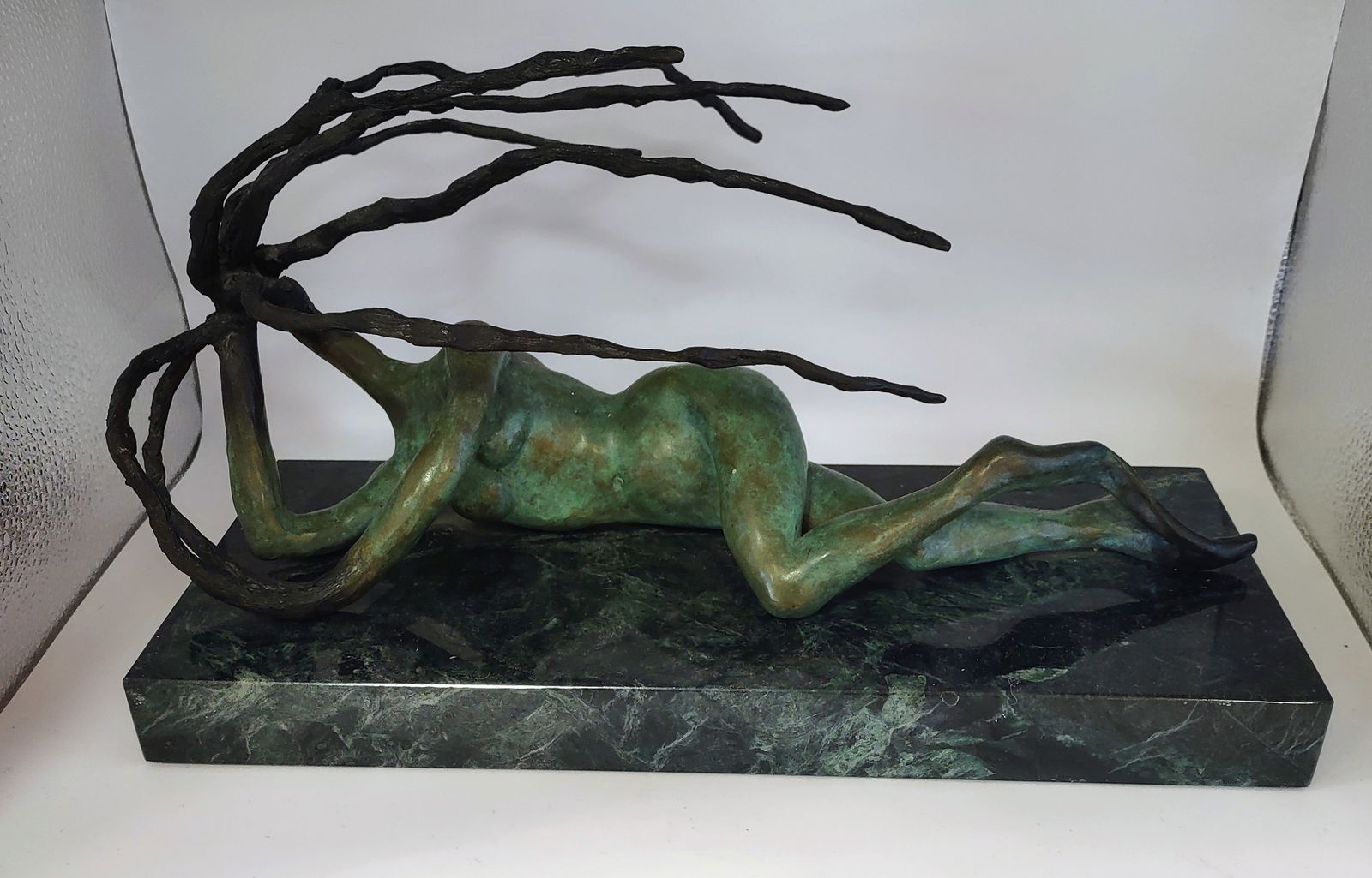 Bronze Statute by "Lorenzo Quinn": A finely cast bronze sculpture depicting a female figure, mounted on a polished marble base. Created by the renowned Italian sculptor Lorenzo Quinn, son of acclaimed actor Anthony Quinn. The work