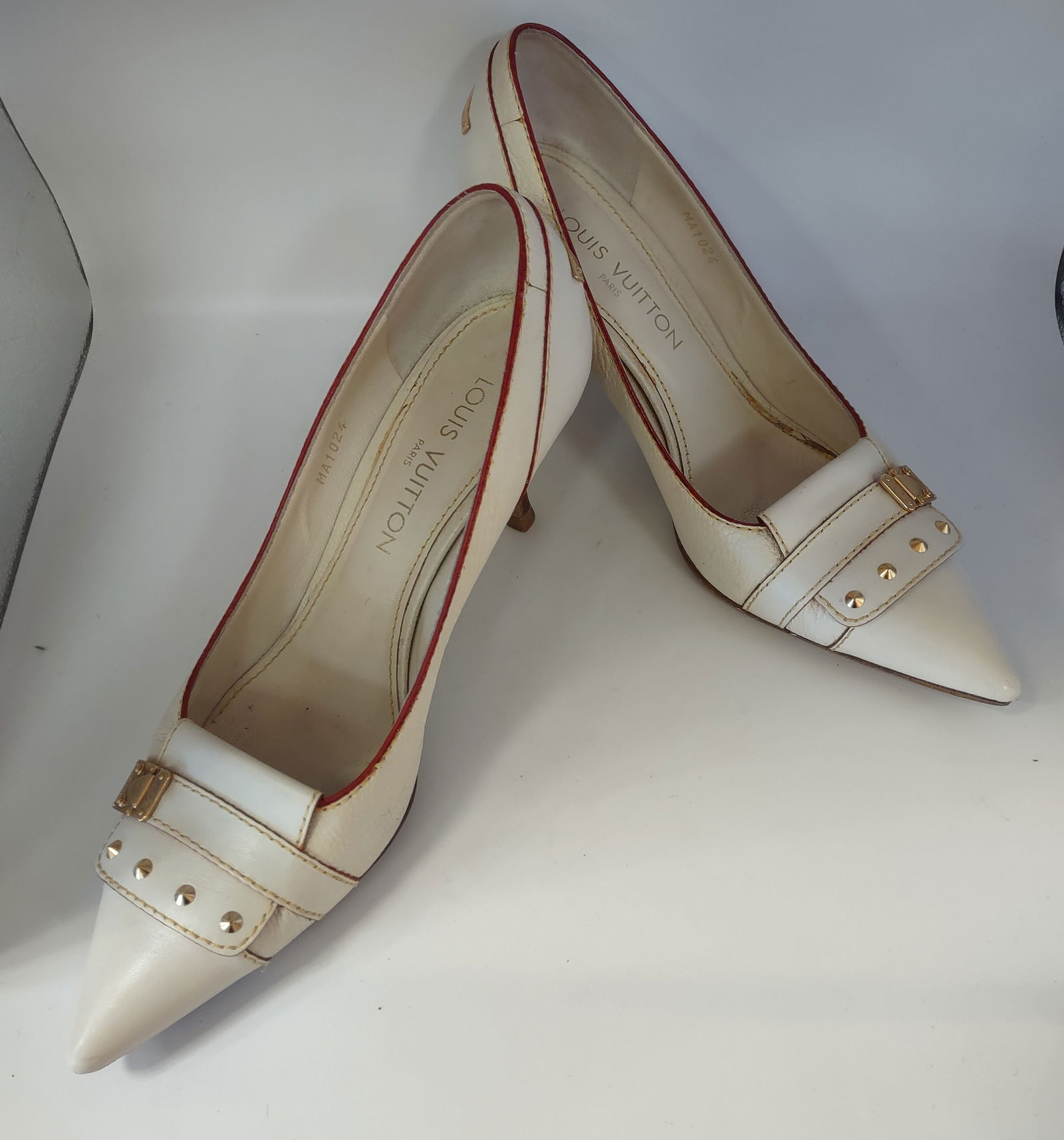 Elegant High heels Shoes by "Louis Vuitton Size 37 1/2: A pair of Authentic Louis Vuitton Neutrals & White Leather Heels featuring Mastic-Colored Stitching and Decorative Brand- Inscibed gilding on the upper.Size 37 1/2