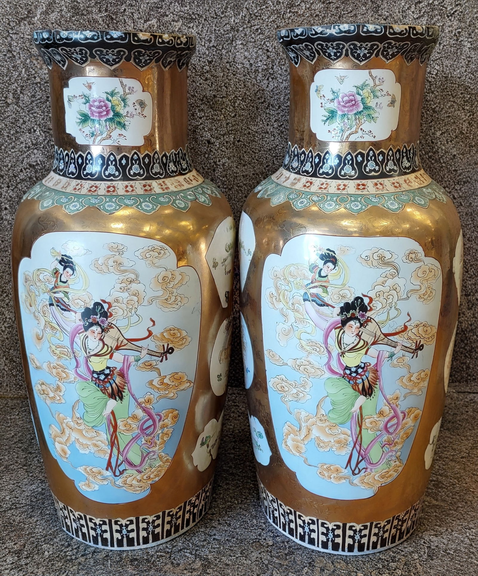 2 Large Chinese Fmille Rose UrnsChinese 37" H: 2 Large Chinese Each of baluster form, decorated on a gilt ground with shaped reserves depicting celestial maidens in flowing robes amid clouds, playing musical instruments, with additional floral