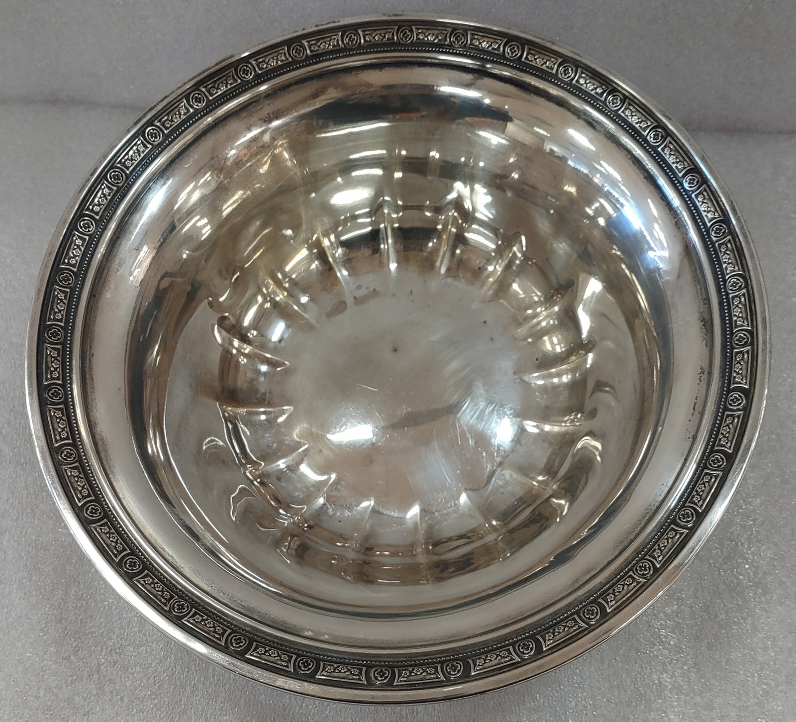 Sterling Silver Bowl 9.5" Round: Sterling Silver bowl measuring approximately 9.5 inches round x 3 inches deep. Elegant classic form suitable for serving or display, with a substantial weight of approximately 9.29 troy ounces.