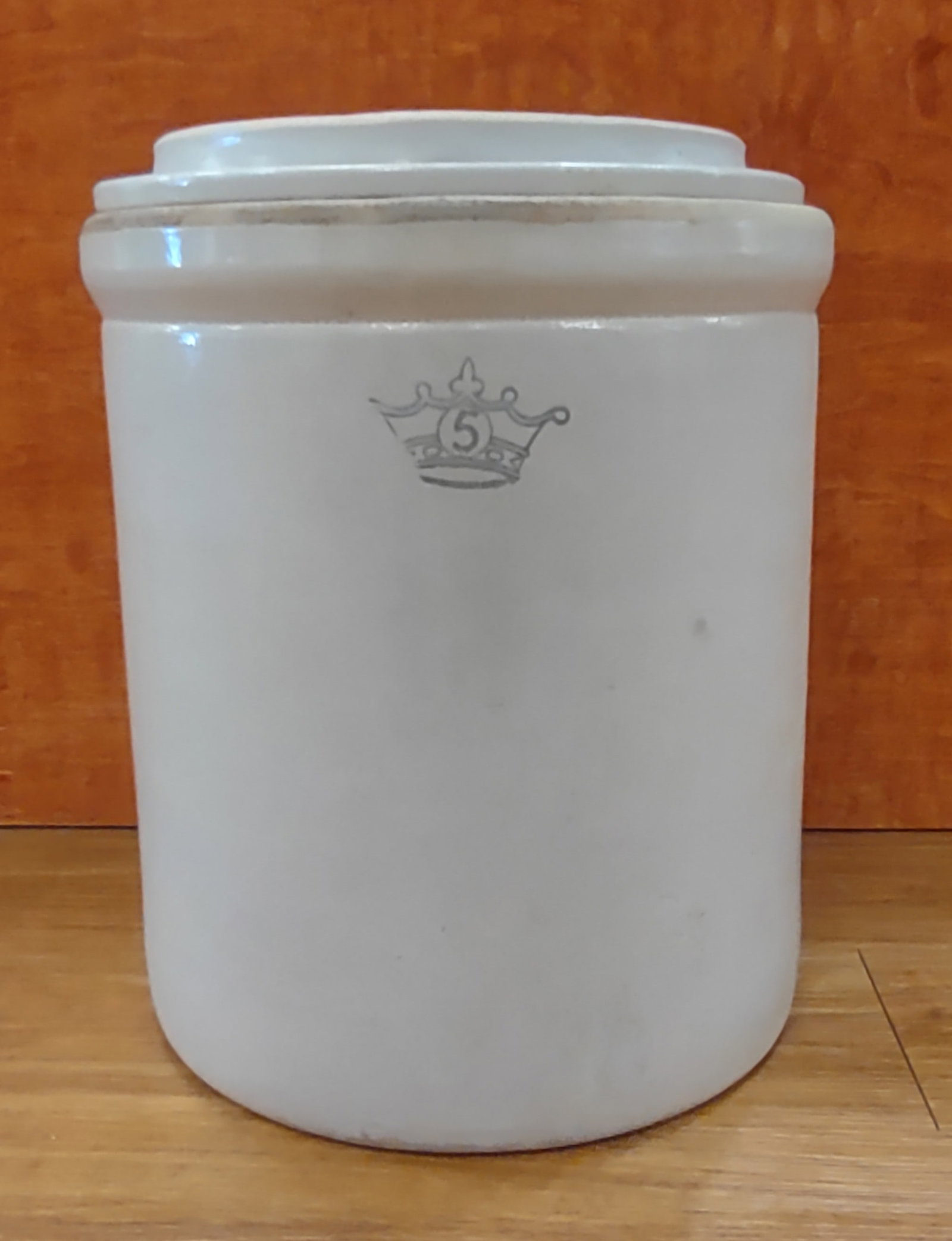 Crock Antique 5 Gallon Blue Crown by Stoneware Robinson Ransbottom: Antique 5-gallon blue crown stoneware crock by Robinson Ransbottom, featuring classic salt-glazed finish with cobalt blue crown decoration. Includes matching lid. Measures approximately 12 inches in