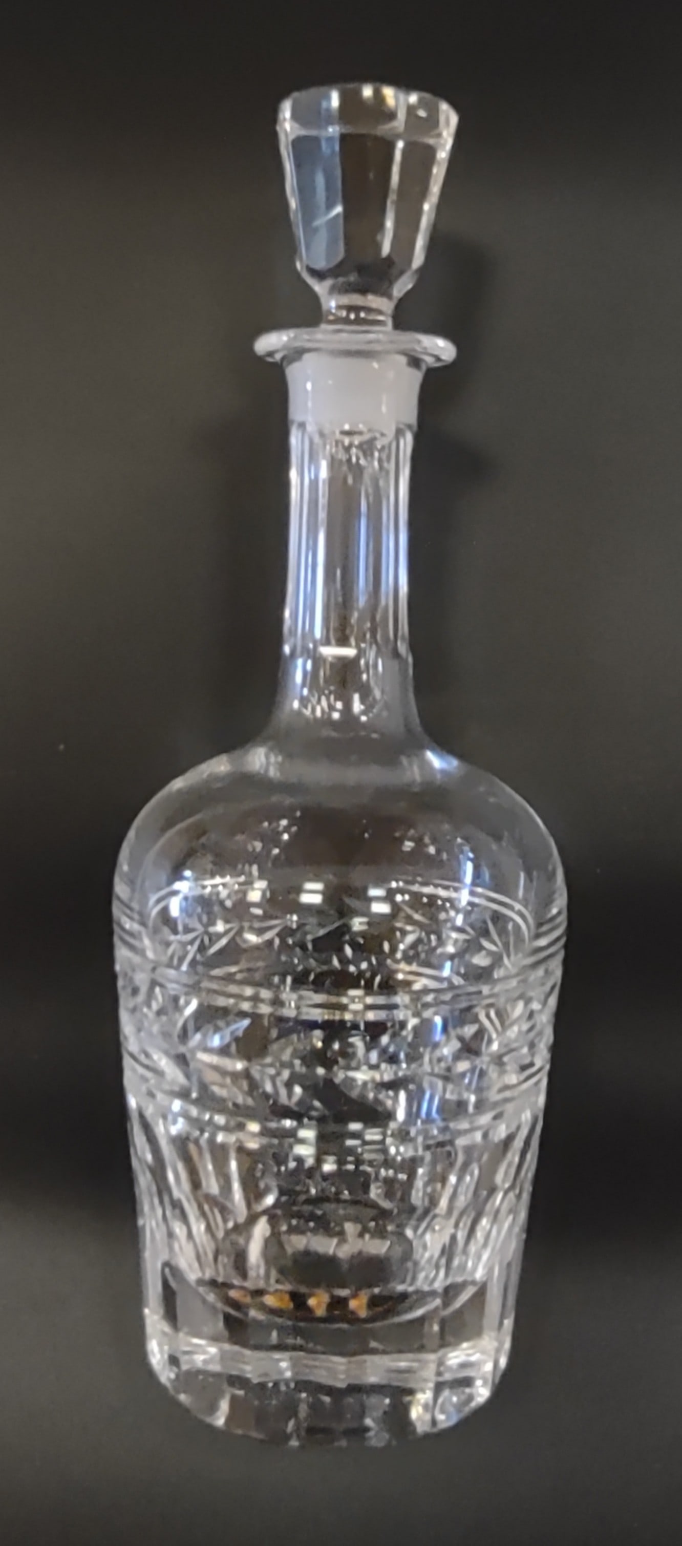 Locchi Firenze Decanter 1 of 2 Italy: Locchi Firenze crystal cut decanter, finely crafted with elegant faceted decoration and classic Italian styling. Stamped “Locchi” and measuring approximately 11.75 inches high. Shipping: