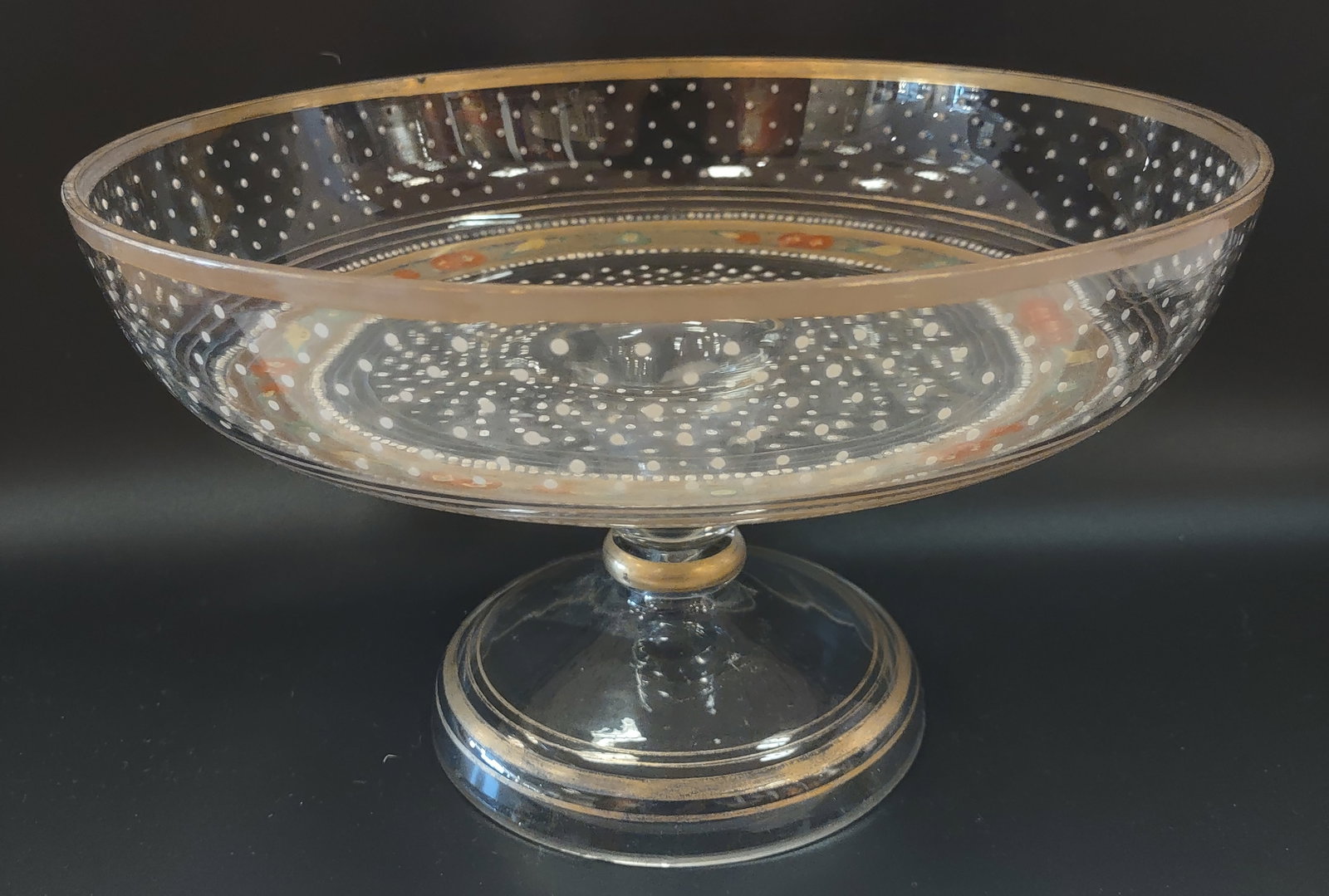 A Venetian Glass Enamelled Footed Fruit Bowl Or Tazza,: Venetian glass enamelled footed fruit bowl (tazza), circular form in clear hand-blown glass with gilt decoration. Finely crafted in the Venetian tradition with elegant raised foot and decorative gold