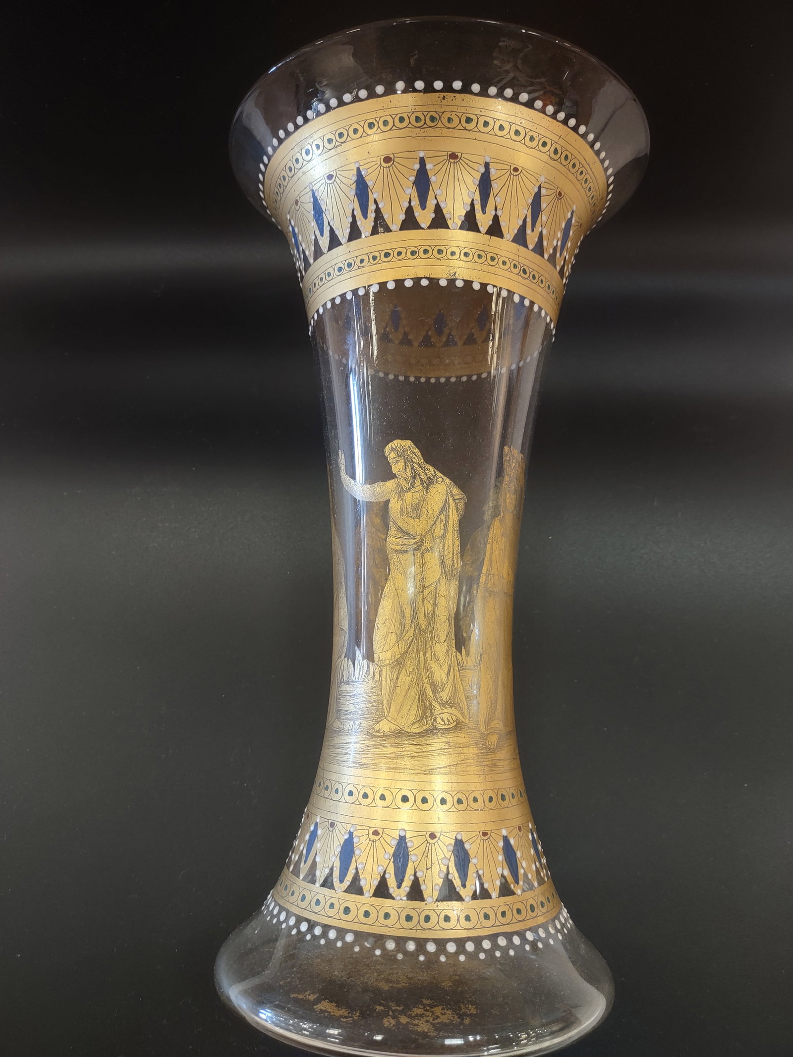 A Venetian Glass Enamelled Vase: Venetian glass enamelled vase in clear hand-blown glass with gilt decoration, reflecting traditional Venetian glassmaking techniques. Elegant form with decorative gold accents and refined silhouette.