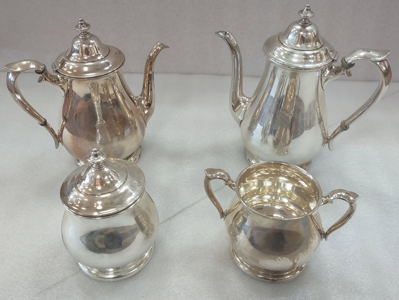 Exquisite Sterling Silver Tea set 2 of 2: Exquiste Sterling Silver Tea Set, Monogrammed Total Silver weight 62.54 oztShipping: Multiple shipping options available. In-house shipping or local pickup is recommended; buyers are not required to u