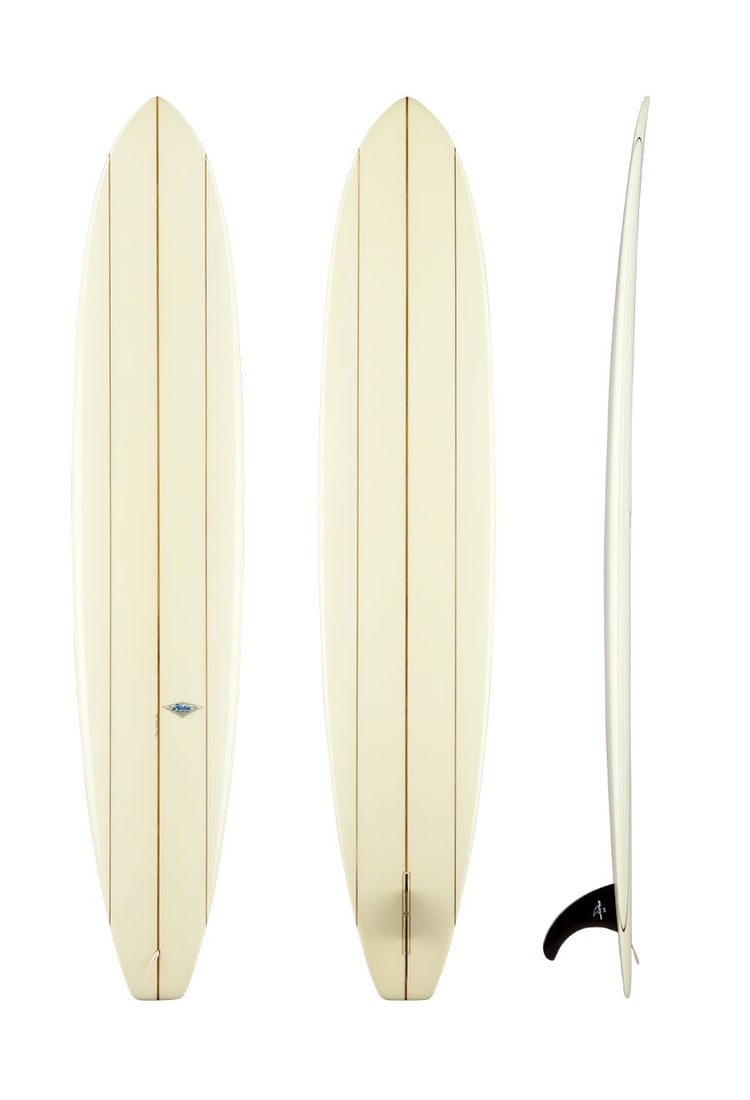 Phil Edwards 9'7" Model: "A beautifully crafted board with a signed photo of Phil Edwards sized at 23.5"x17.25", a true icon of the sport. The surfboard is signed by Phil as well.Phil Edwards was the first surfer to have his