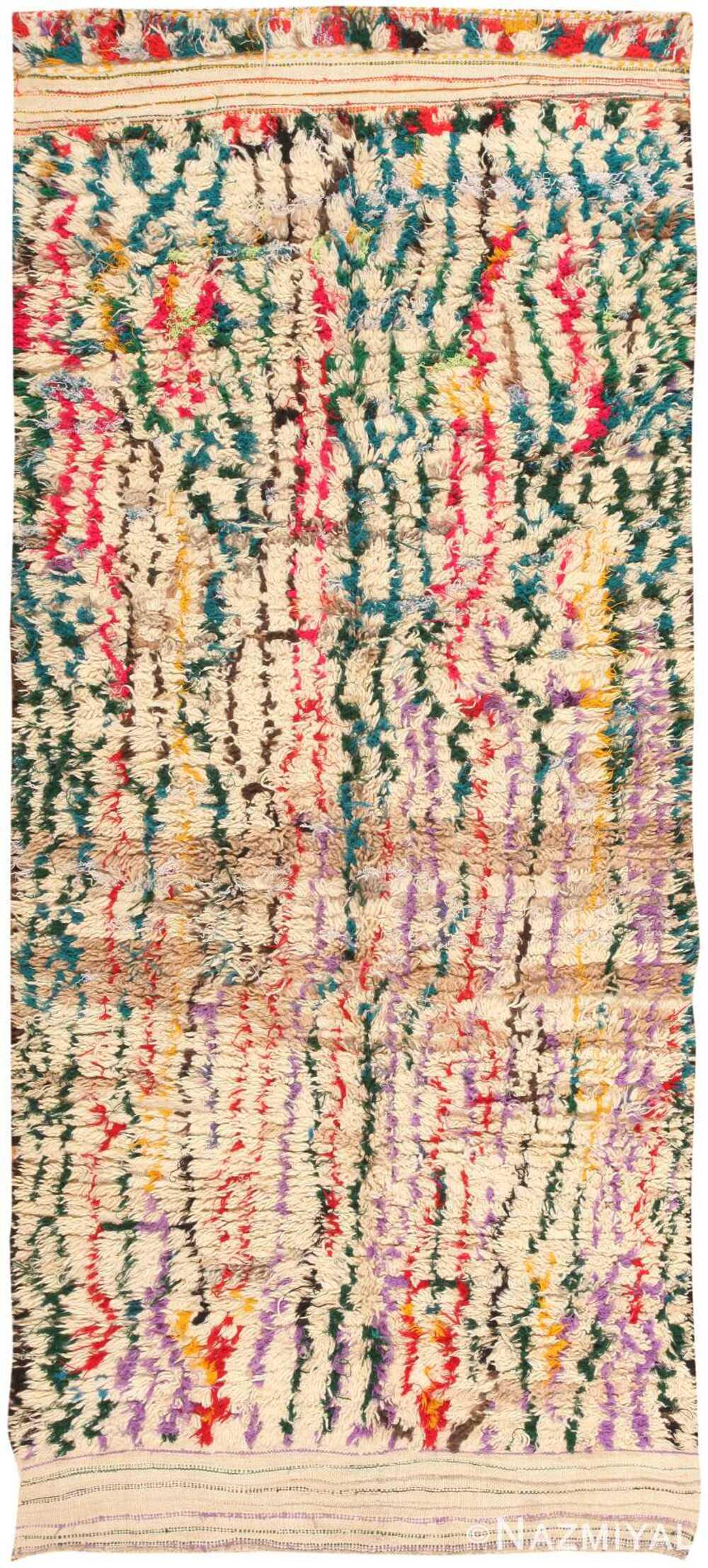 VINTAGE COLORFUL MOROCCAN RUG. 10 ft 7 in x 4 ft 7 in: From Nazmiyal Collection. VINTAGE COLORFUL MOROCCAN RUG. Circa date: Mid-Twentieth Century. 10 ft 7 in x 4 ft 7 in (3.23 m x 1.4 m). This antique and vintage rug auction consists of a collection of: P