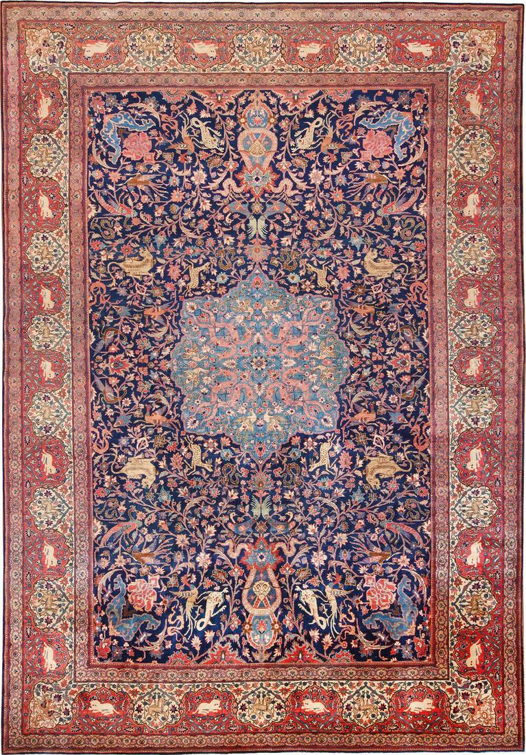 ANTIQUE PERSIAN SAROUK FARHAN RUG. 15 ft 6 in x 10 ft 9: Property of a New York designer ANTIQUE PERSIAN SAROUK FARHAN RUG. 15 ft 6 in x 10 ft 9 in (4.72 m x 3.28 m). Stunning Animal Design Blue Background Antique Persian Sarouk Farahan Area Rug, Country o