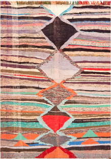Vintage Boucherouite Moroccan Rug - 6 ft 8 in x 4 ft 9 in (2.03 m x 1.45 m): Curated collection of antique, vintage and modern rugs Vintage Boucherouite Moroccan Rug Size: 6 ft 8 in x 4 ft 9 in (2.03 m x 1.45 m) This Boucherouite rug features a central column of nested diamond