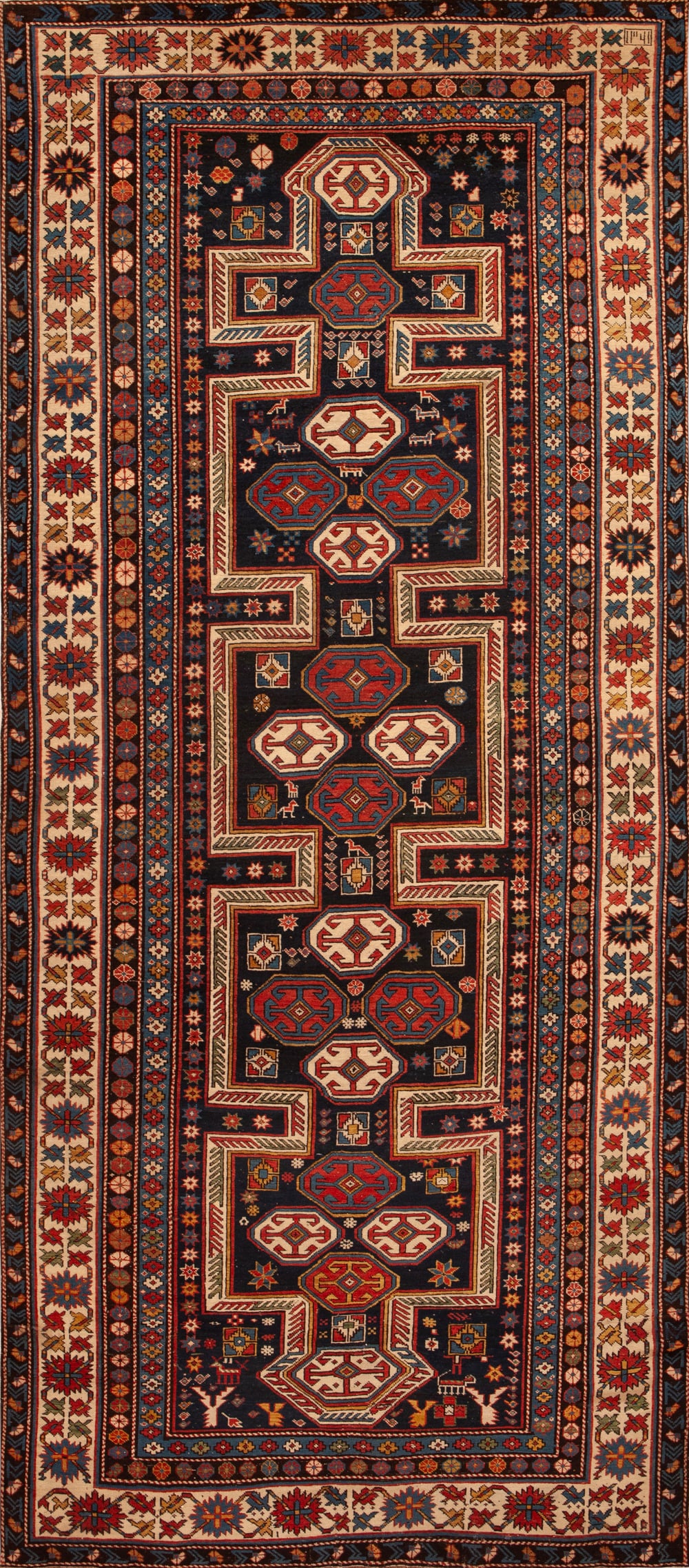 Antique Caucasian Shirvan Rug 10 ft 11 in x 4 ft 9 in (3.32 m x 1.44 m): Curated collection of antique, vintage and modern rugs Antique Caucasian Shirvan Rug Size: 10 ft 11 in x 4 ft 9 in (3.32 m x 1.44 m) Provenance: Property of New York dealer An antique Caucasian